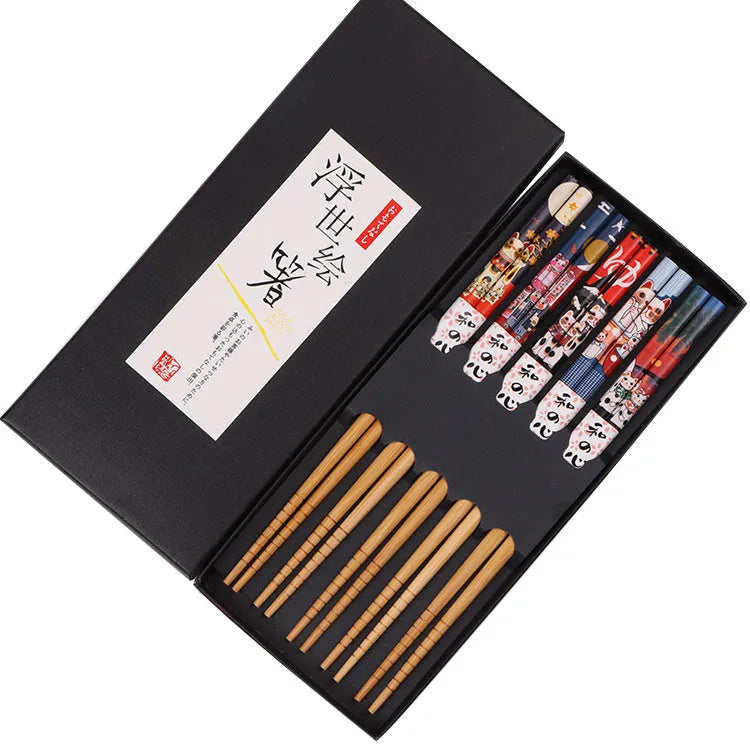 Five pairs of Japanese-style patterned bamboo chopsticks in lucky cat or elegant blue designs with cartoon patterns