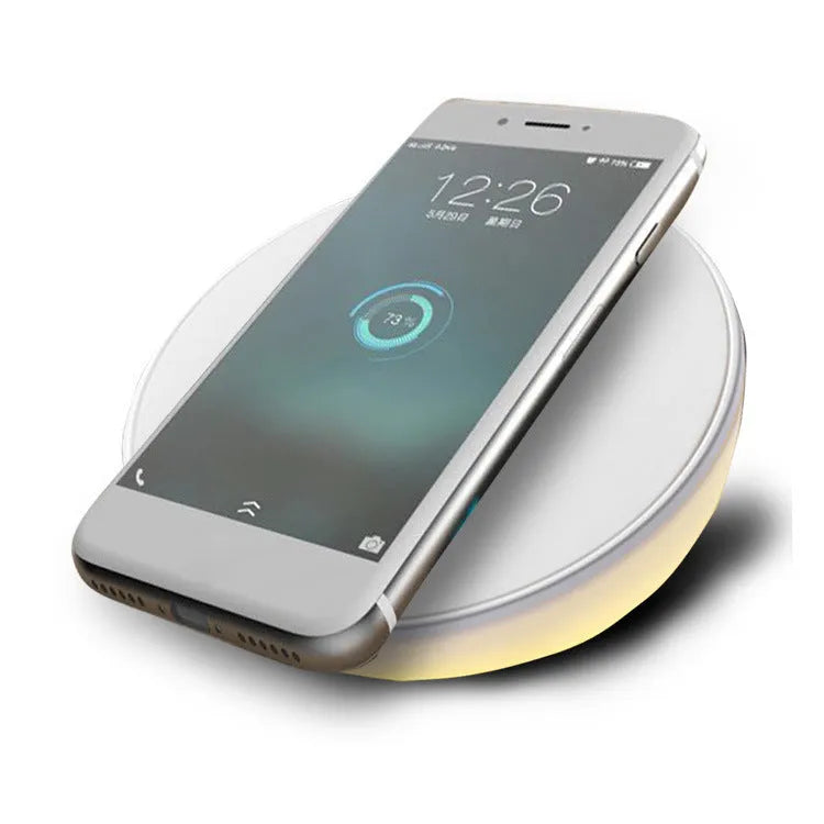 White wireless phone charger with digital clock display and alarm function