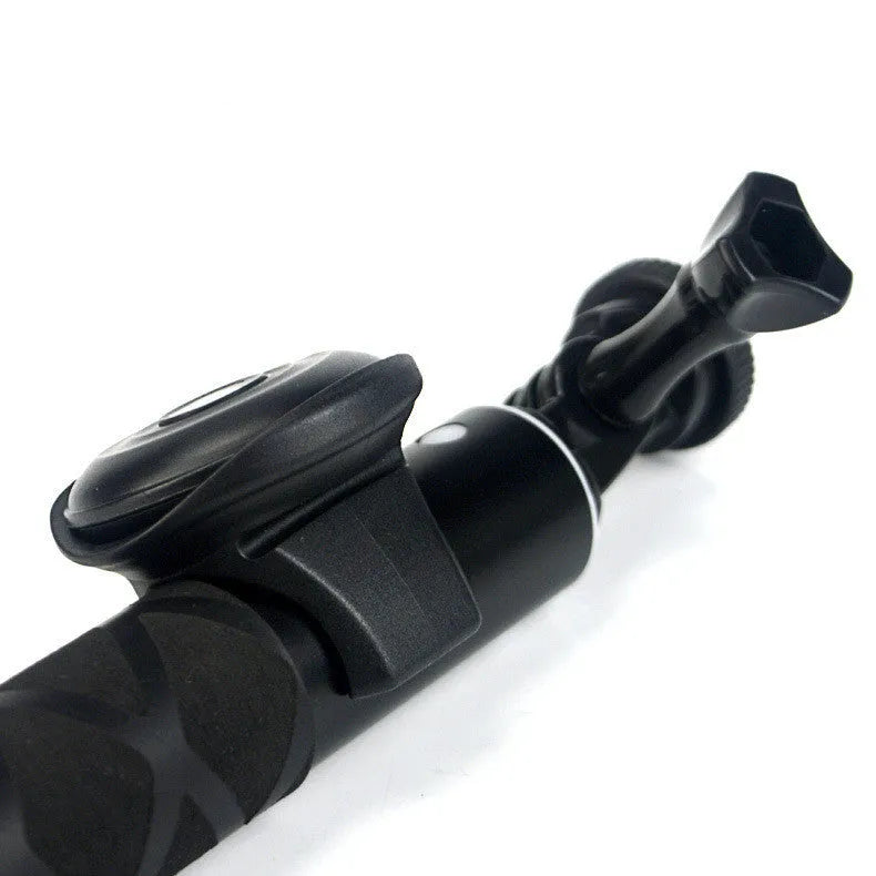 Black Bluetooth remote control for wireless selfie photography with smartphone connection