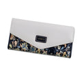Women's three-fold PU leather wallet with buckle closure and metal clip in five colour options