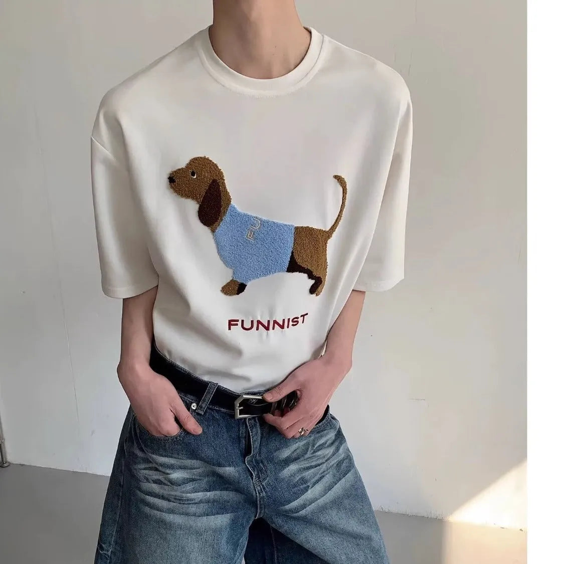 Men's grey T-shirt with embroidered sausage dog towel design on front, short sleeves and round neck