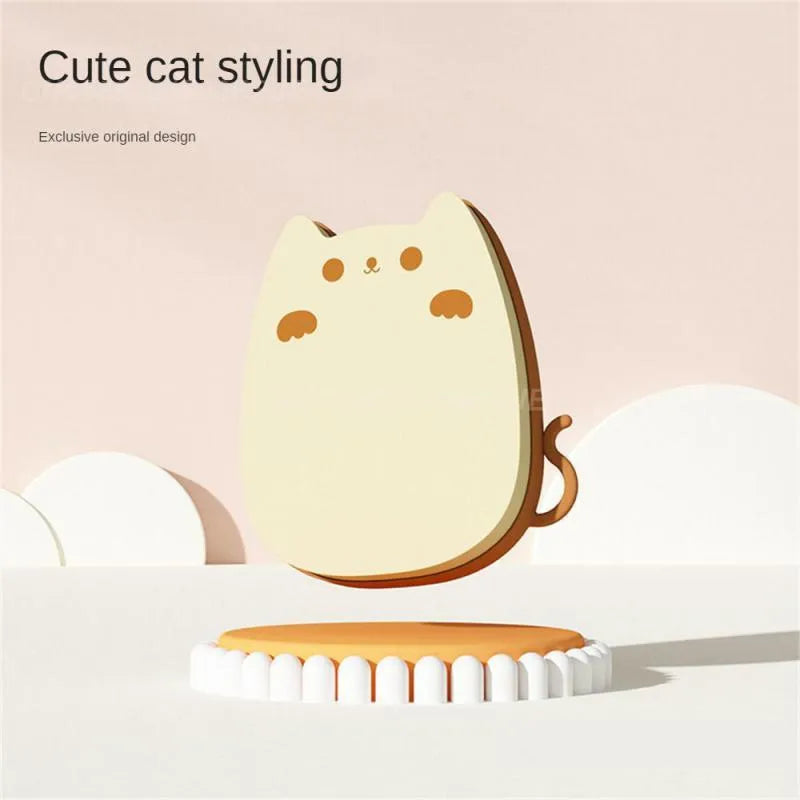 Brown sponge silicone pet grooming brush with dual-texture comb teeth on white background