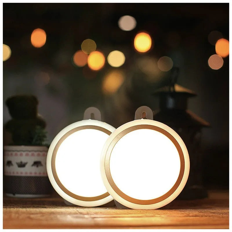Smart battery-powered motion sensor LED light with infrared sensing on a white background.