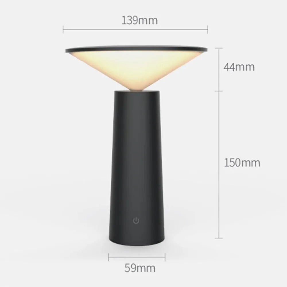 Black USB LED desk lamp with touch sensor base and an angled lamp head on a wooden desk.
