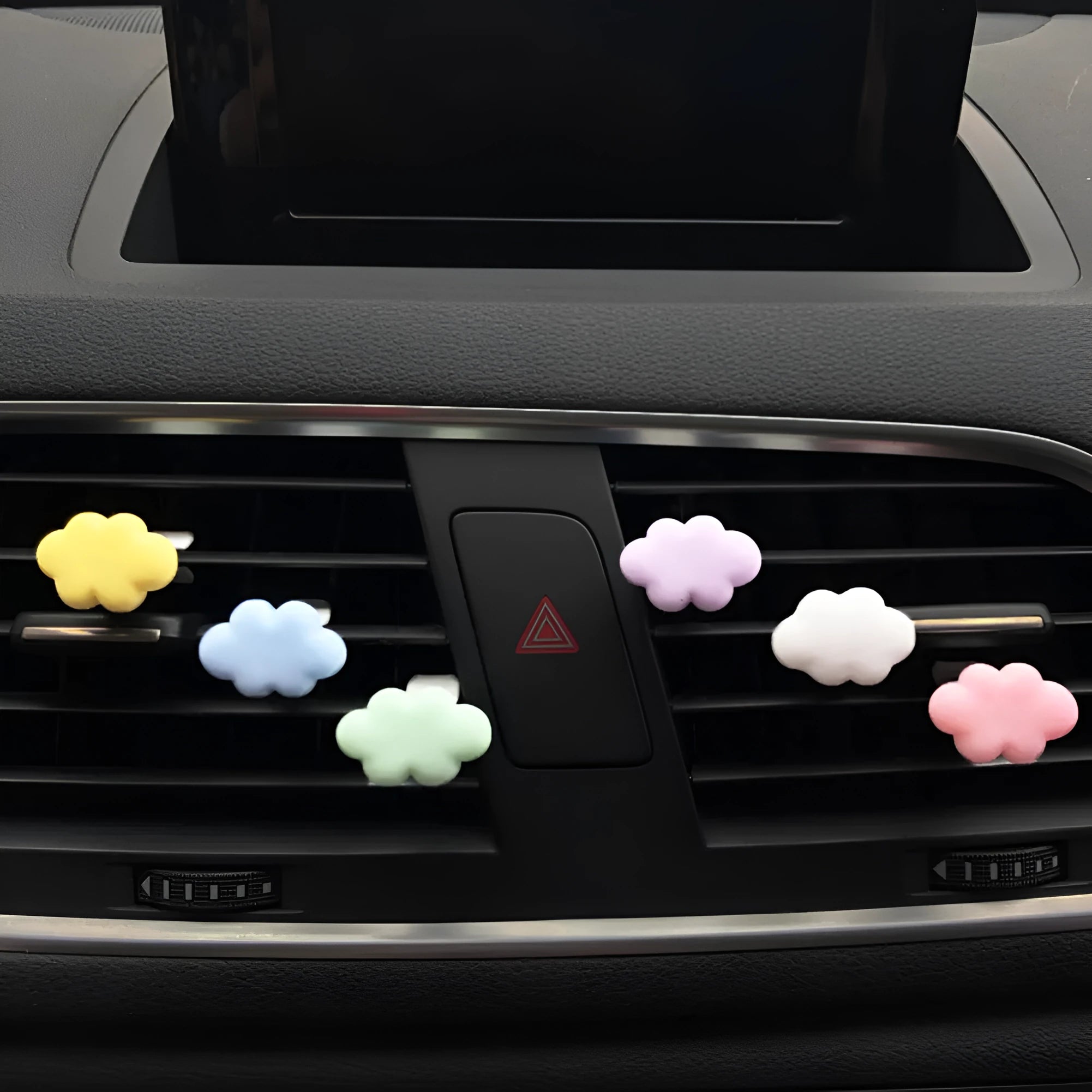 Resin Baiyun cartoon character car air vent fragrance clip in assorted colours.