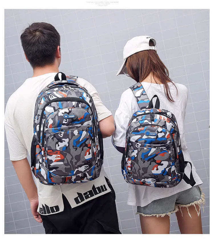 Blue Oxford fabric backpack for teenagers with breathable straps and side pockets
