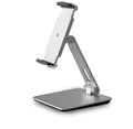 Black foldable aluminium phone and tablet stand with 360-degree rotation on a wooden desk