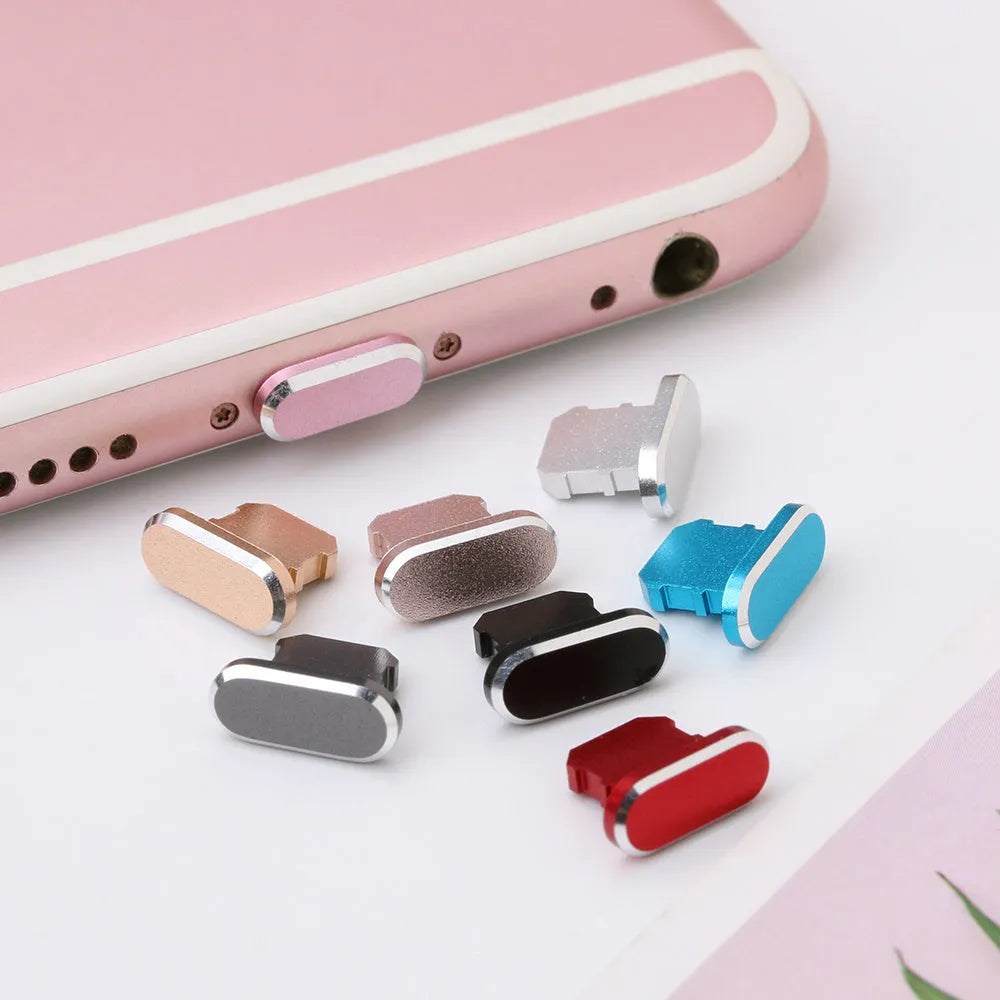 Aluminium alloy dust plug for iPhone charging port in various colours including gold, silver, and rose gold.
