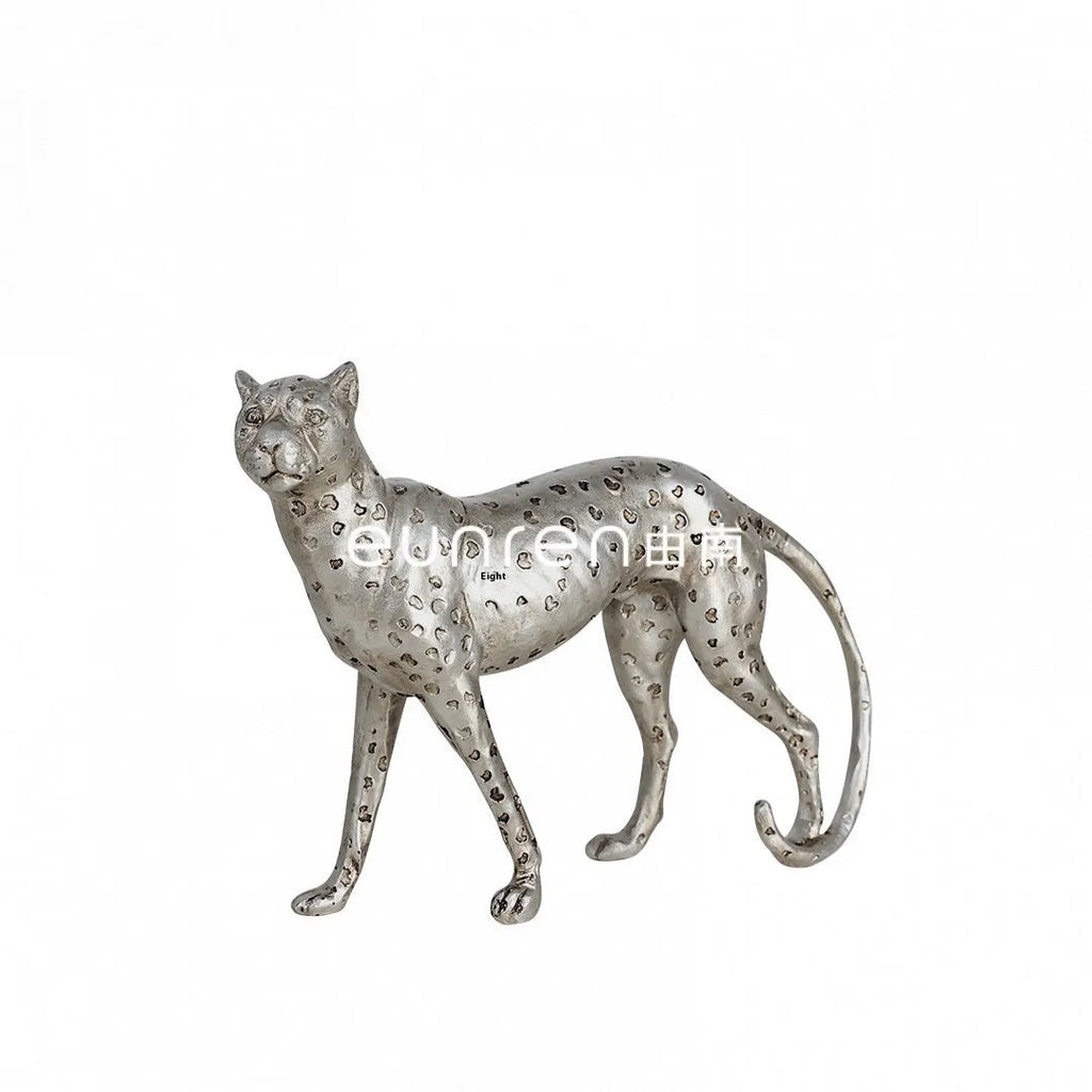 Modern leopard resin ornament sculpture in American Leopard colour on wooden shelf