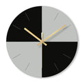 Minimalist transparent tempered glass wall clock with silent movement on a white wall.