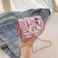 Women's mini saddle crossbody bag in horizontal square design with single shoulder strap