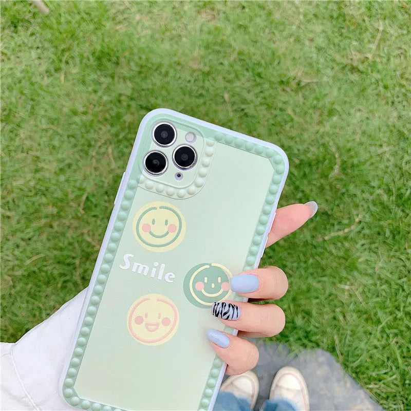 Geometric smiley face TPU phone case for iPhone with polka dot frame design
