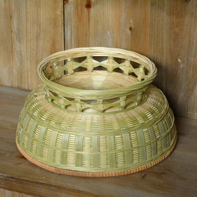 Handmade woven bamboo storage basket in three different sizes for household organisation