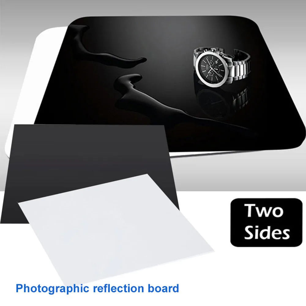 Black and white acrylic square reflection boards for product photography on a table