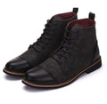Men's black leather motorcycle boots with silver belt buckles on the shaft