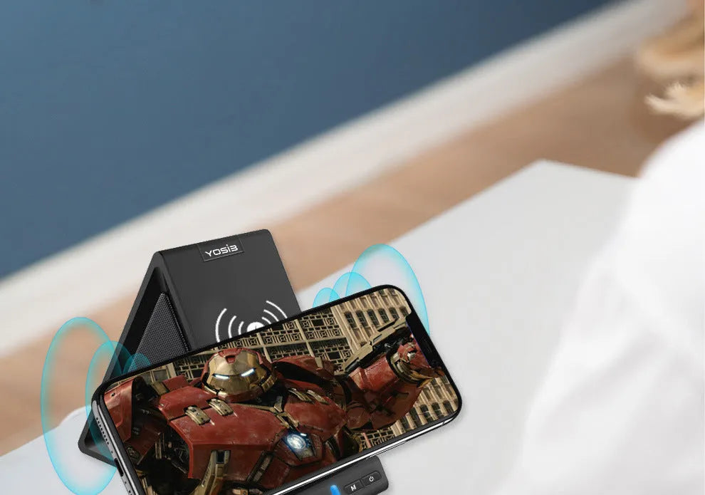 Black multifunctional Bluetooth speaker and wireless charger with built-in mobile phone stand.