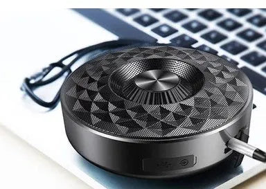 Compact Bluetooth portable speaker in black, orange or silvery white colours showing wireless connectivity