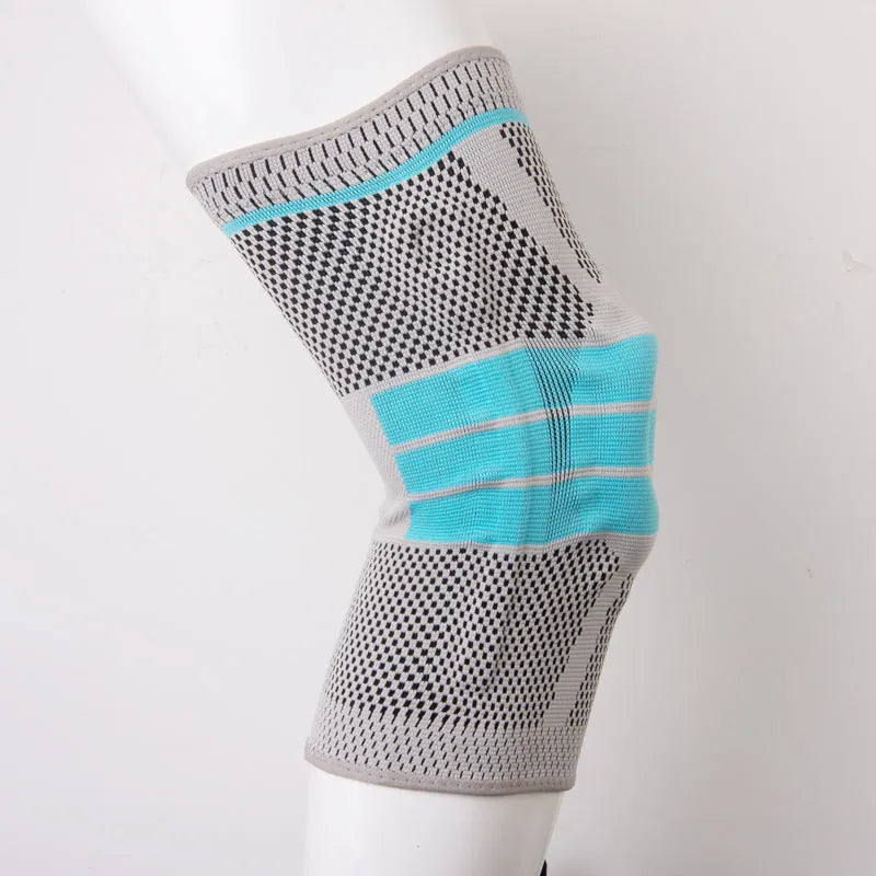 Sky blue silicone running and basketball knee pads showing elastic fibre material on a neutral background.