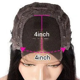 A woman wearing a long, real human hair lace front wig with a 4x4 transparent lace hairline.