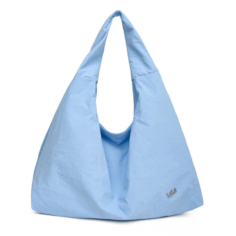 Women's heart-shaped underarm bag in nylon with large capacity, shown in available colours