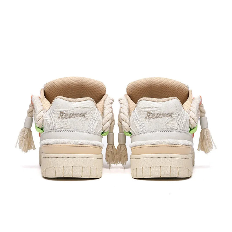 Creamy white retro low-top skate shoes with old damage lace and a platform sole