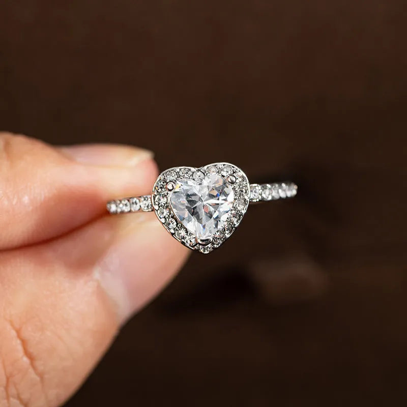 Heart-shaped crystal women's wedding ring with electroplated rose gold finish on white copper band