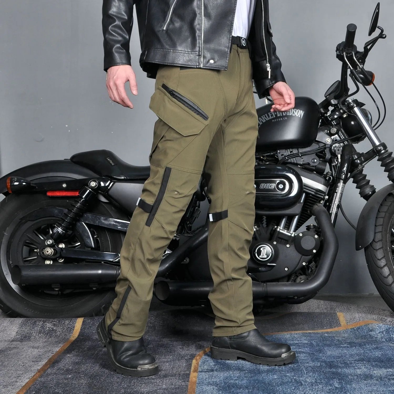 Men's waterproof motorcycle cycling trousers with protective gear in black or green colour options