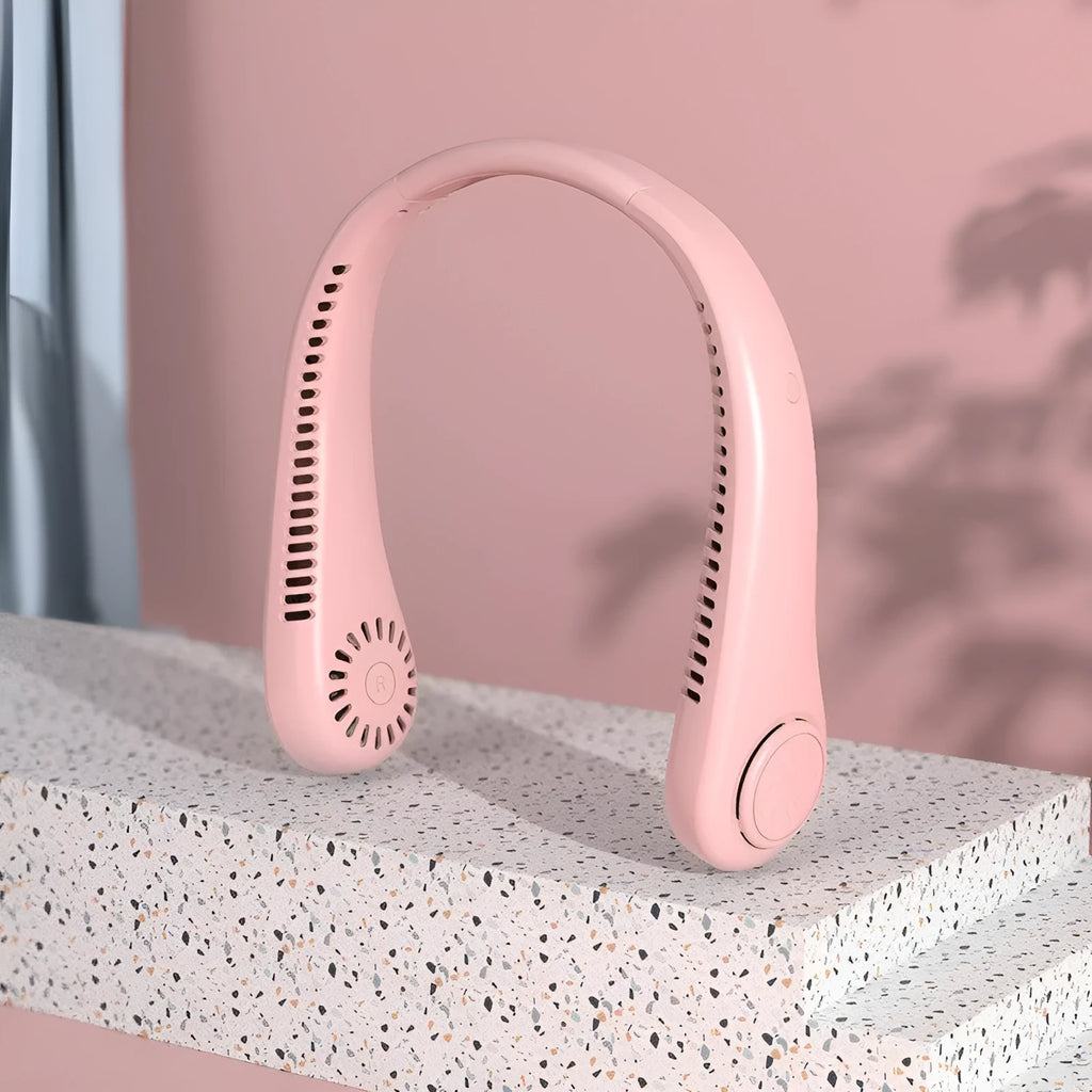 Pink bladeless neck fan with soft neckband, showing USB charging port and control buttons.