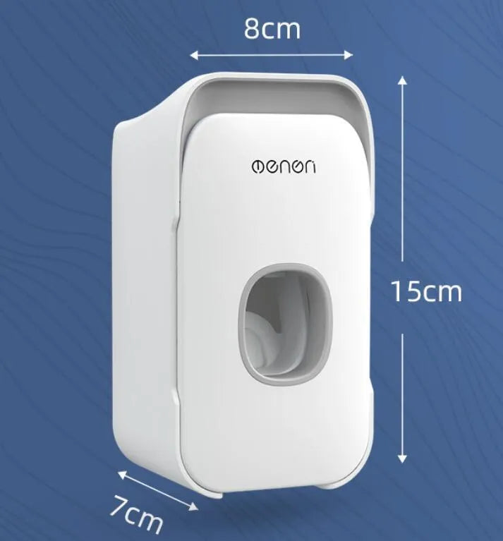 Blue automatic toothpaste dispenser with wall-mount bracket on a bathroom wall