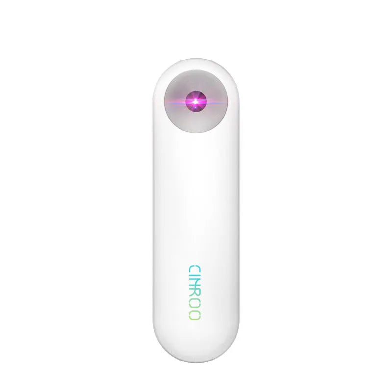 White Spot portable ultraviolet steriliser lamp showing compact dimensions next to a mobile phone for scale.