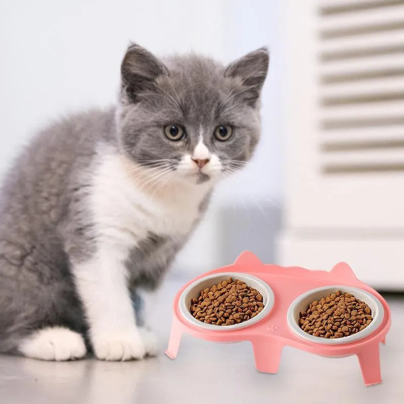 Blue ceramic cat food and water bowls on a white elevated ABS stand with a hook.