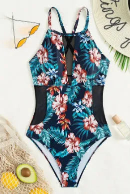 Women's deep V-neck one-piece swimsuit in a solid colour on a mannequin.