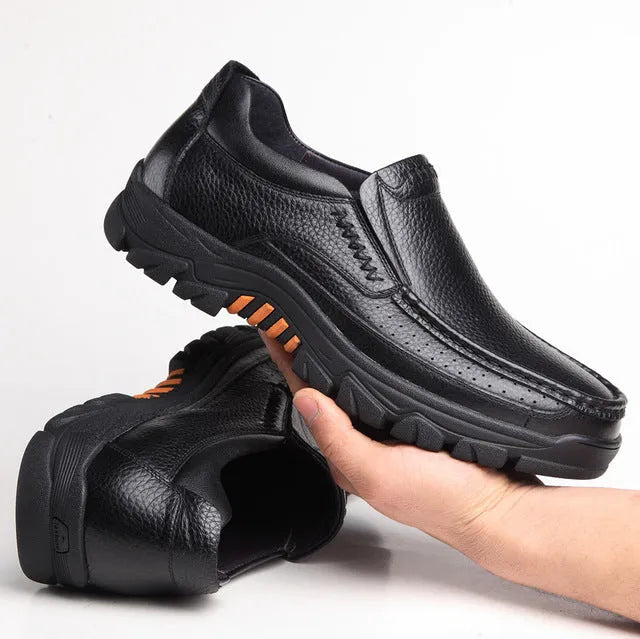 Men's black leather slip-on business casual shoes with a rubber sole.