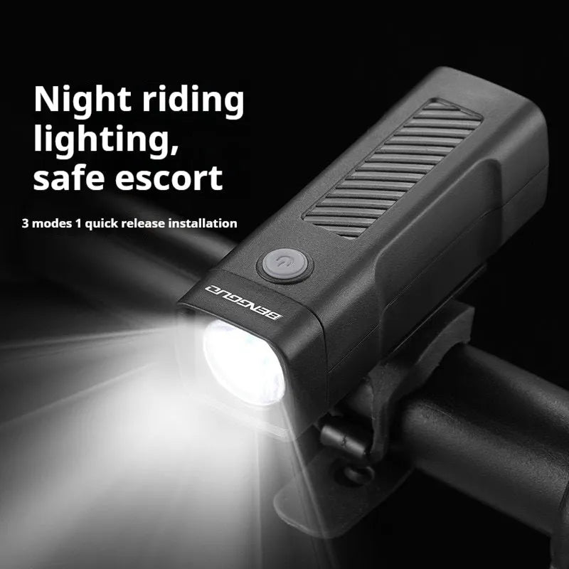 USB rechargeable bicycle headlight with quick-release strap bracket mounted on handlebars