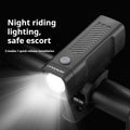 USB rechargeable bicycle headlight with quick-release strap bracket mounted on handlebars