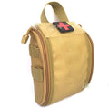 Tactical medical kit open to show sterile dressings, bandages, thermometer, ice pack, and medicines including cooling oil.