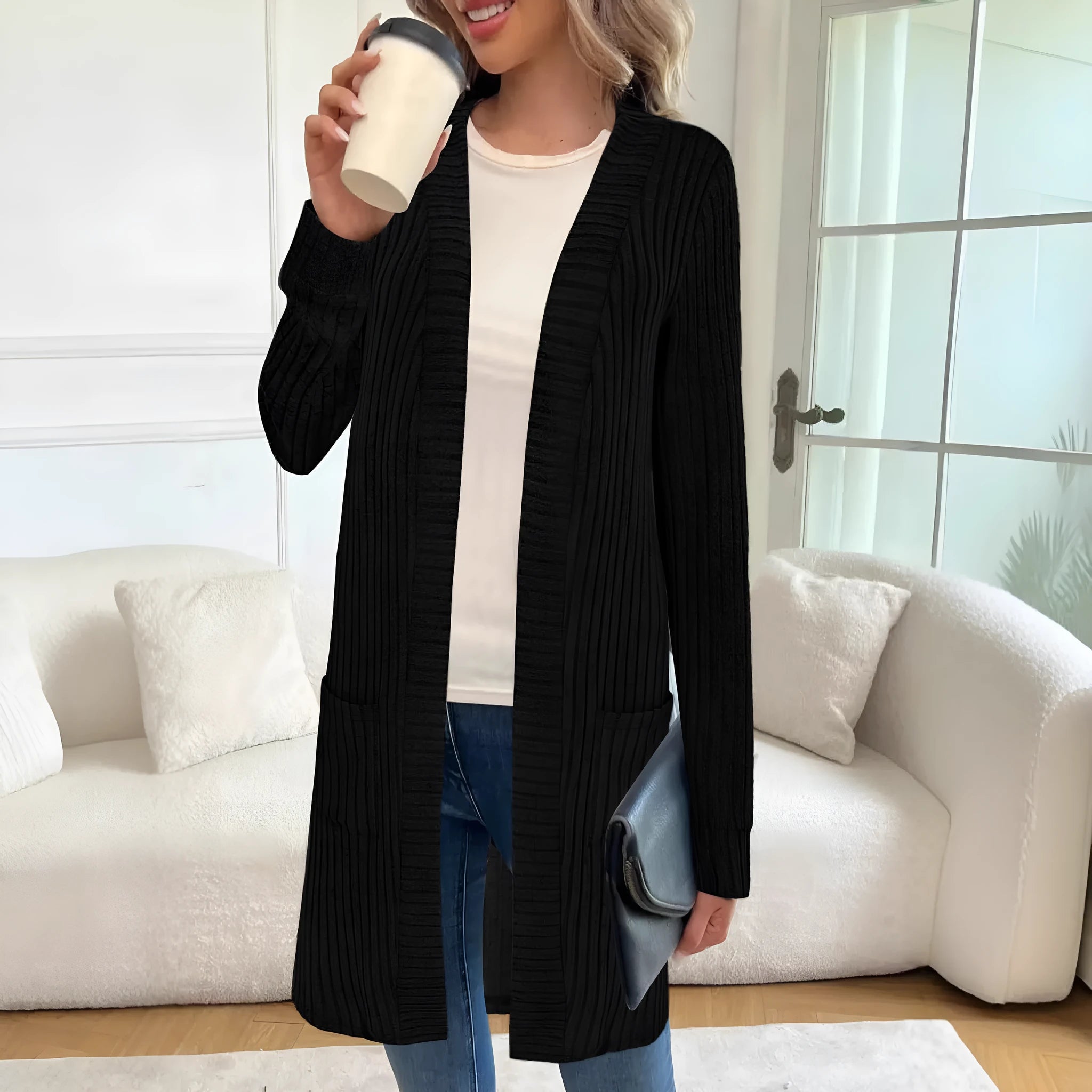 Long sleeve loose fit knitted cardigan jacket with pockets in grey.