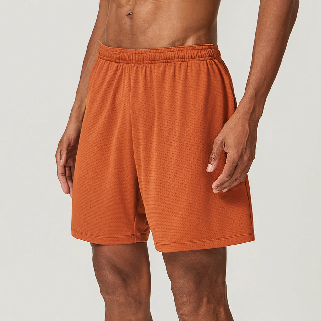 Men's quick-drying nylon running shorts in sky green, shown with mid-waist and short length design.