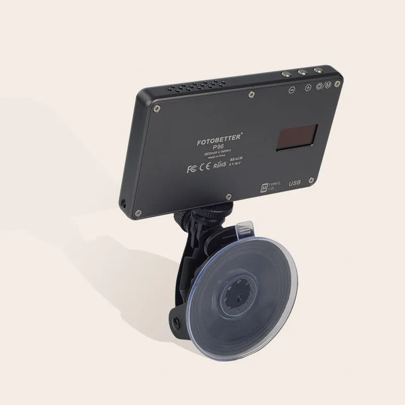 Black aluminium portable LED video light for laptop conferences shown with USB-C cable.