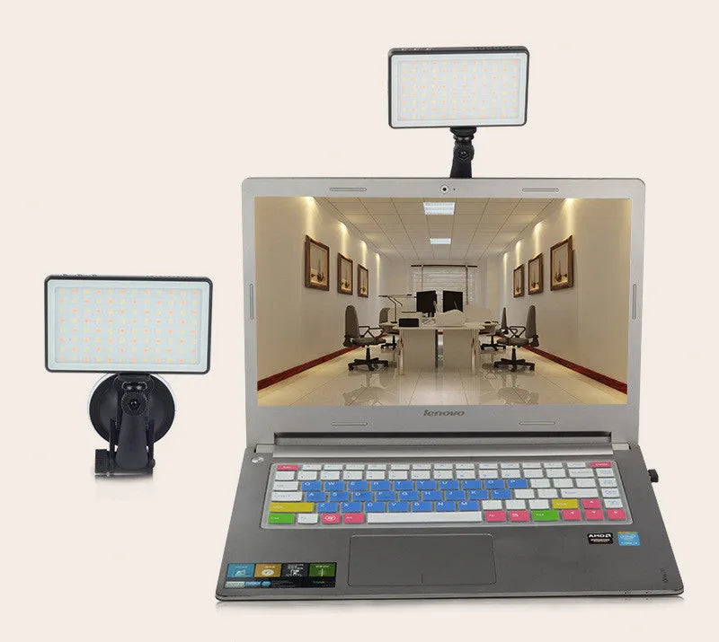 Black aluminium portable LED video light for laptop conferences shown with USB-C cable.