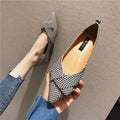 Women's red pointed low-heel shoes with cotton upper and Korean style shallow mouth design on plain background