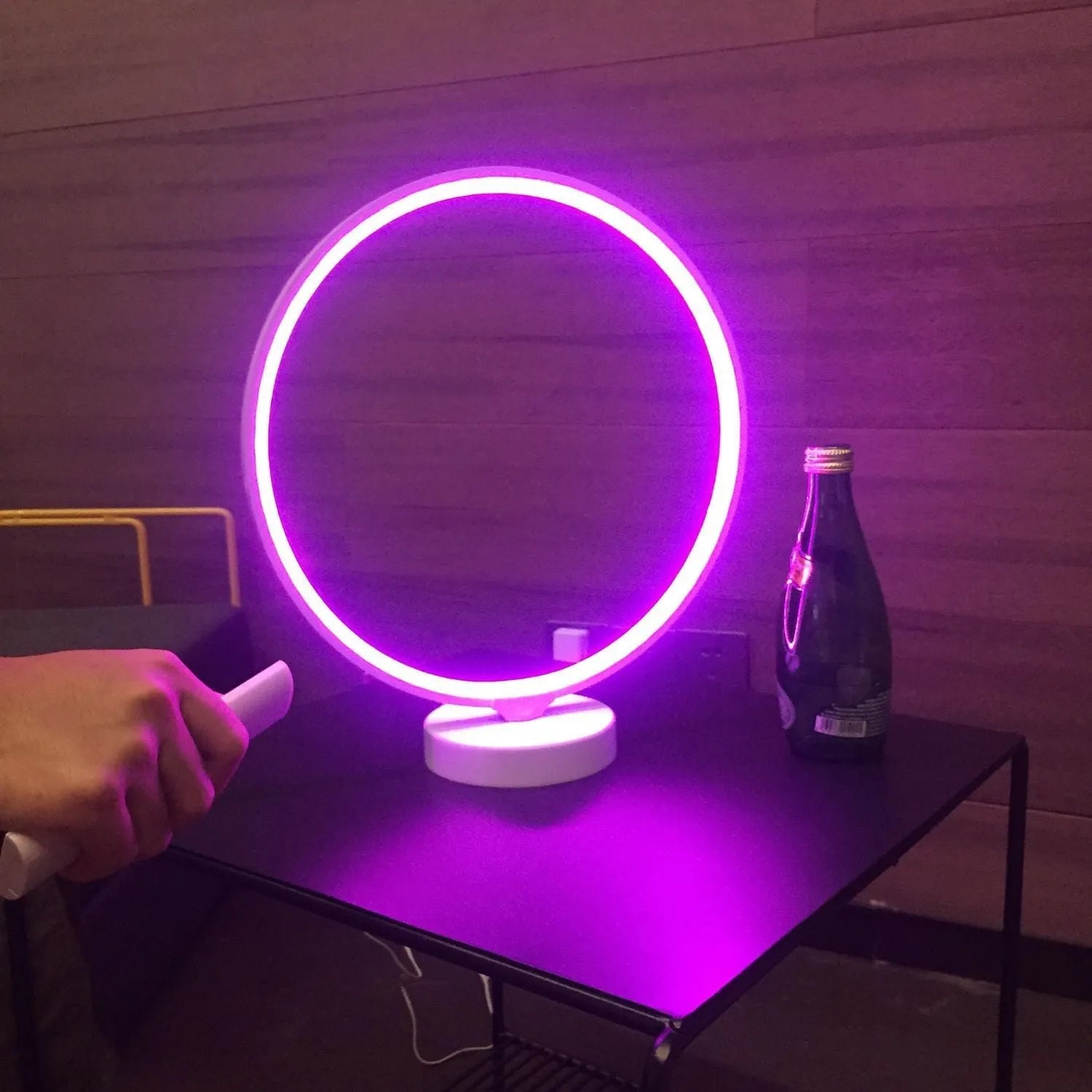 White Full Moon Table Lamp with remote control on a wooden surface