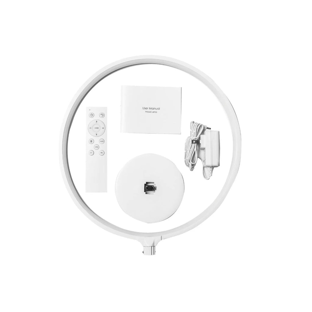 White Full Moon Table Lamp with remote control on a wooden surface