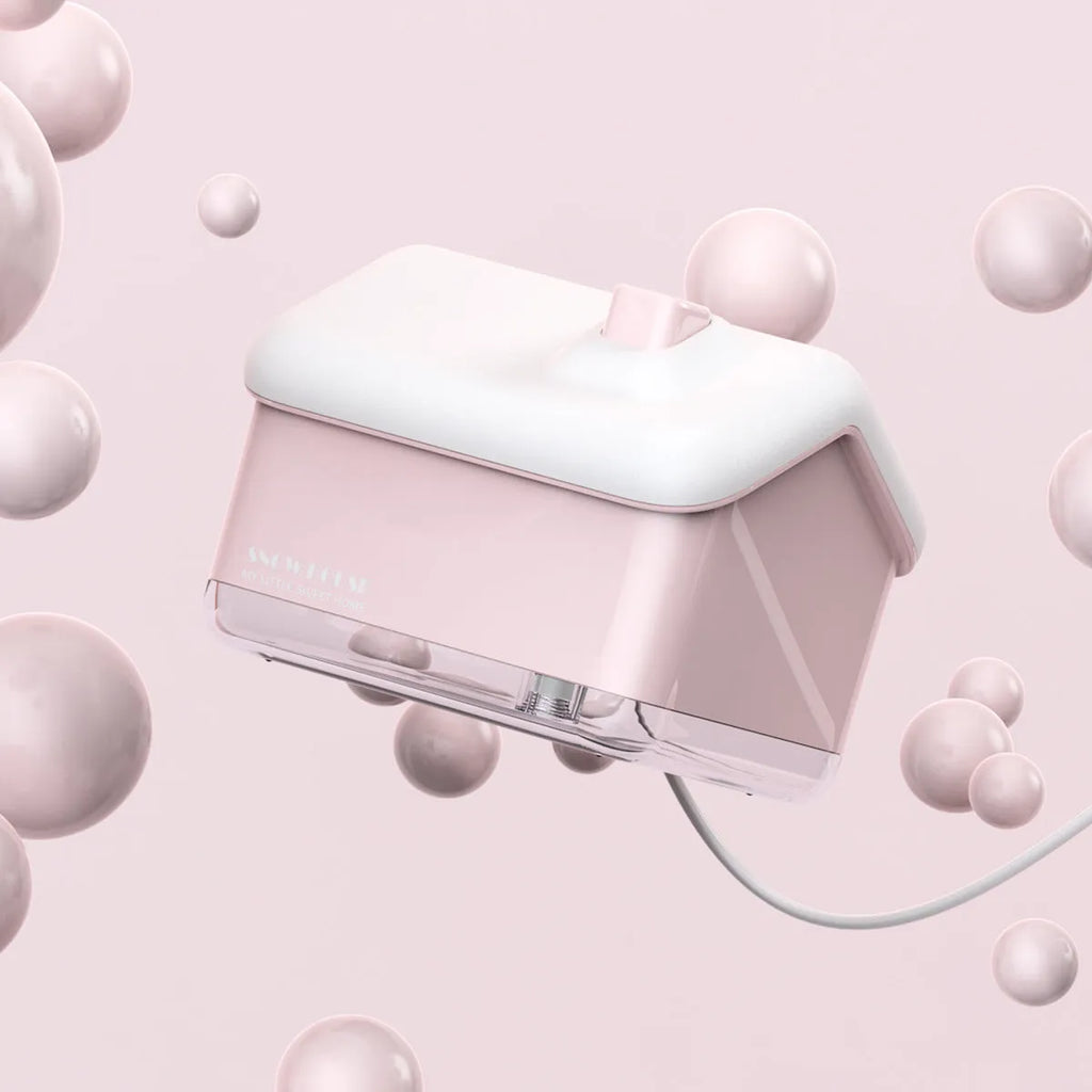 White igloo-shaped ultrasonic humidifier and essential oil diffuser with LED light and USB cable.