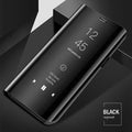 Black Samsung Galaxy mirror flip case with kickstand open, showing phone and interior mirror.