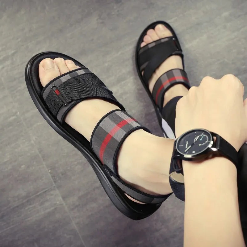 Youth sports sandals with Lycra upper and polyurethane sole in a leisure style.