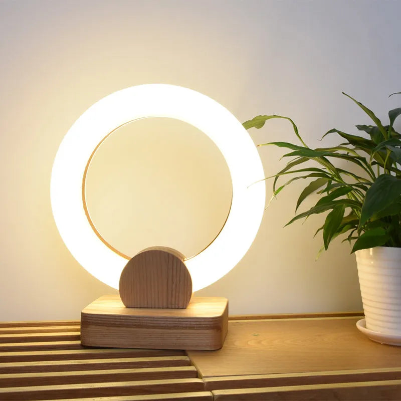 Nordic style circular chandelier lamp with a round acrylic shade and integrated LED light