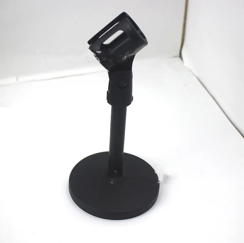 Black steel desktop microphone bracket with circular base and plastic microphone clip