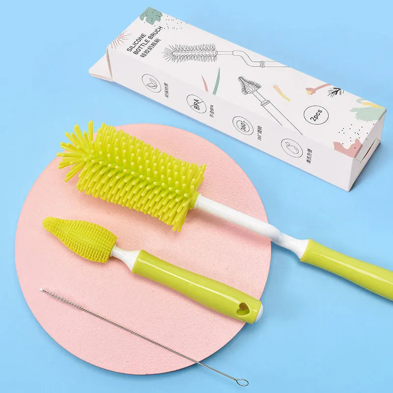 Silicone baby bottle brush and straw cleaning set in pink, blue, and yellow colour options