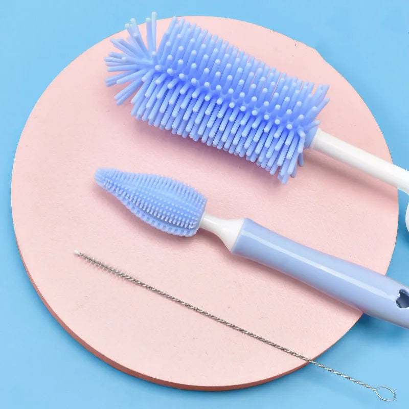Silicone baby bottle brush and straw cleaning set in pink, blue, and yellow colour options